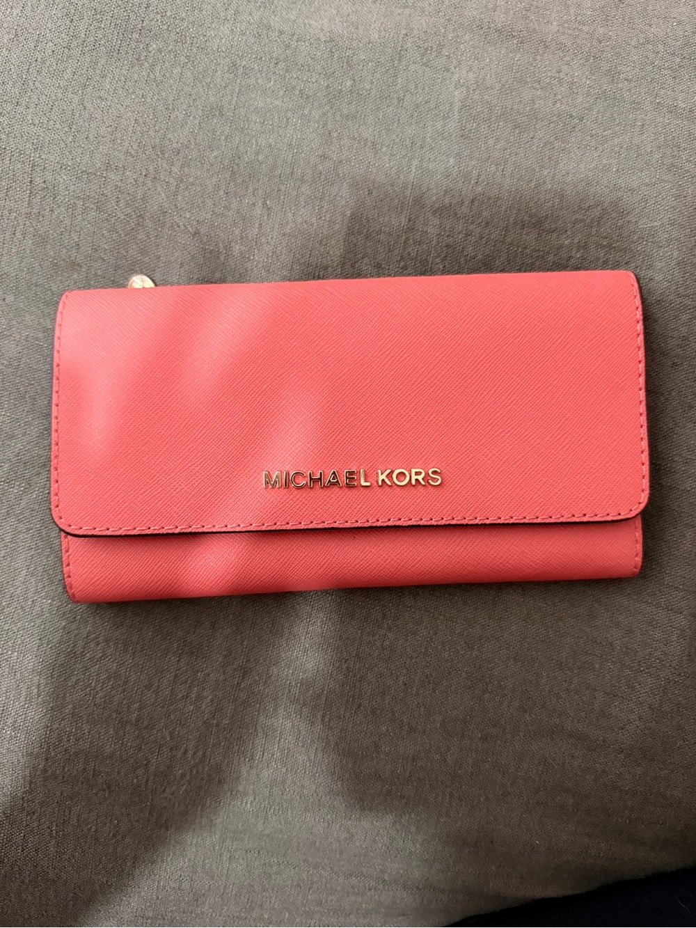 MICHAEL Michael Kors Coral Pink Saffiano Trifold Wallet with Gold Logo